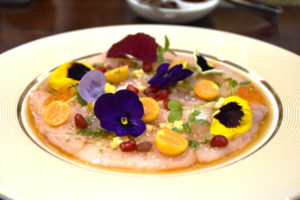 Hamachi Carpaccio with Golden berries and edibles